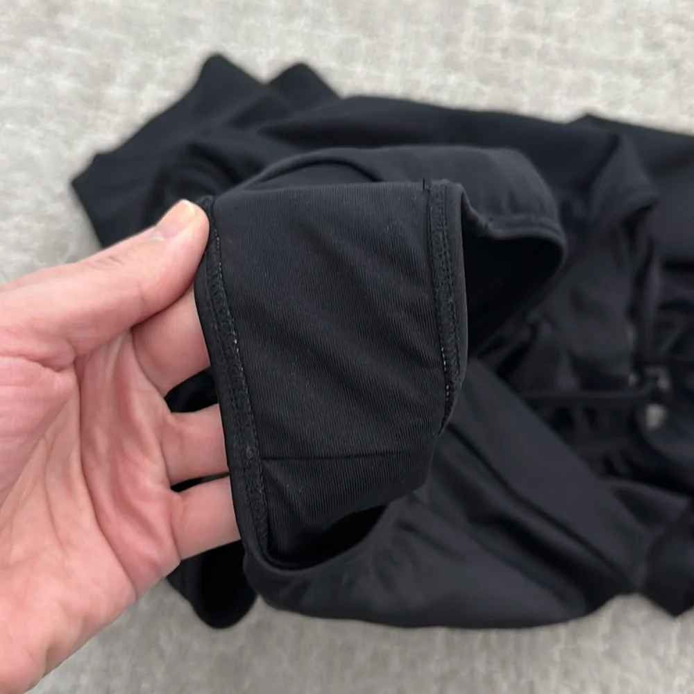 Albion “the wave” one piece black swimsuit ruffle sleeve off the shoulder